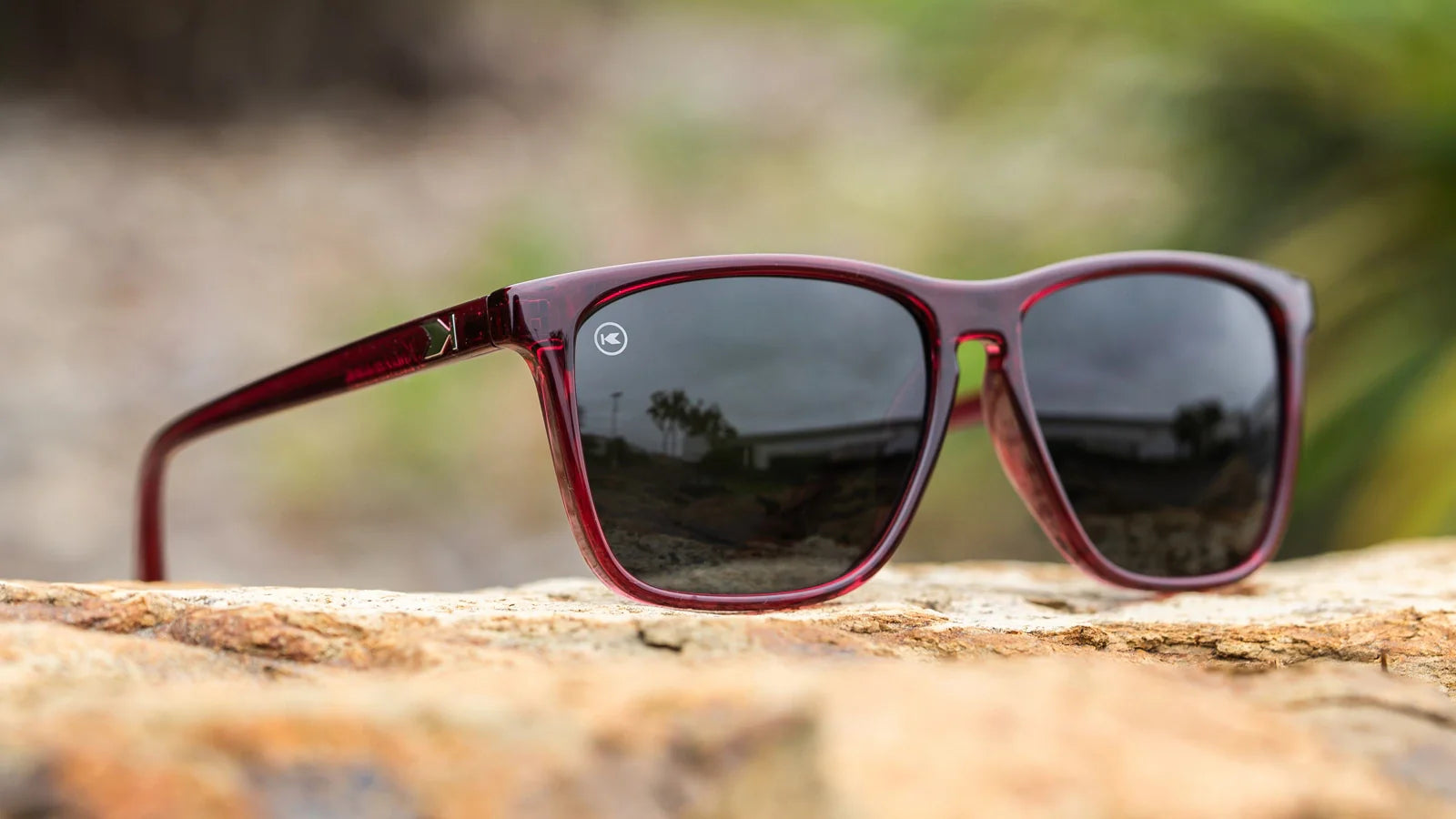 Lifestyle photo of Black Cherry Fast Lanes Sunglasses