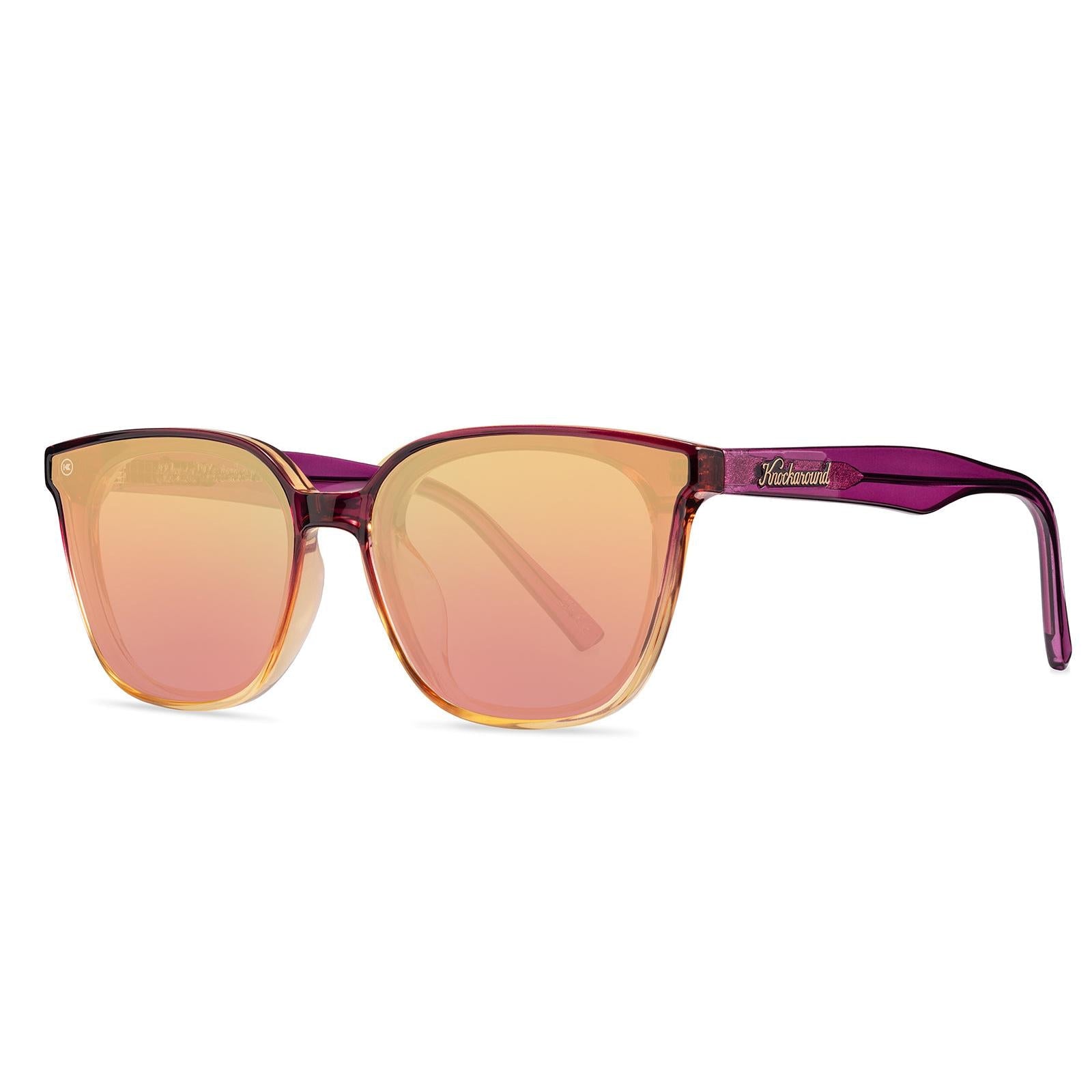 Sunglasses with purple frame with polarized pink lenses, threequarter