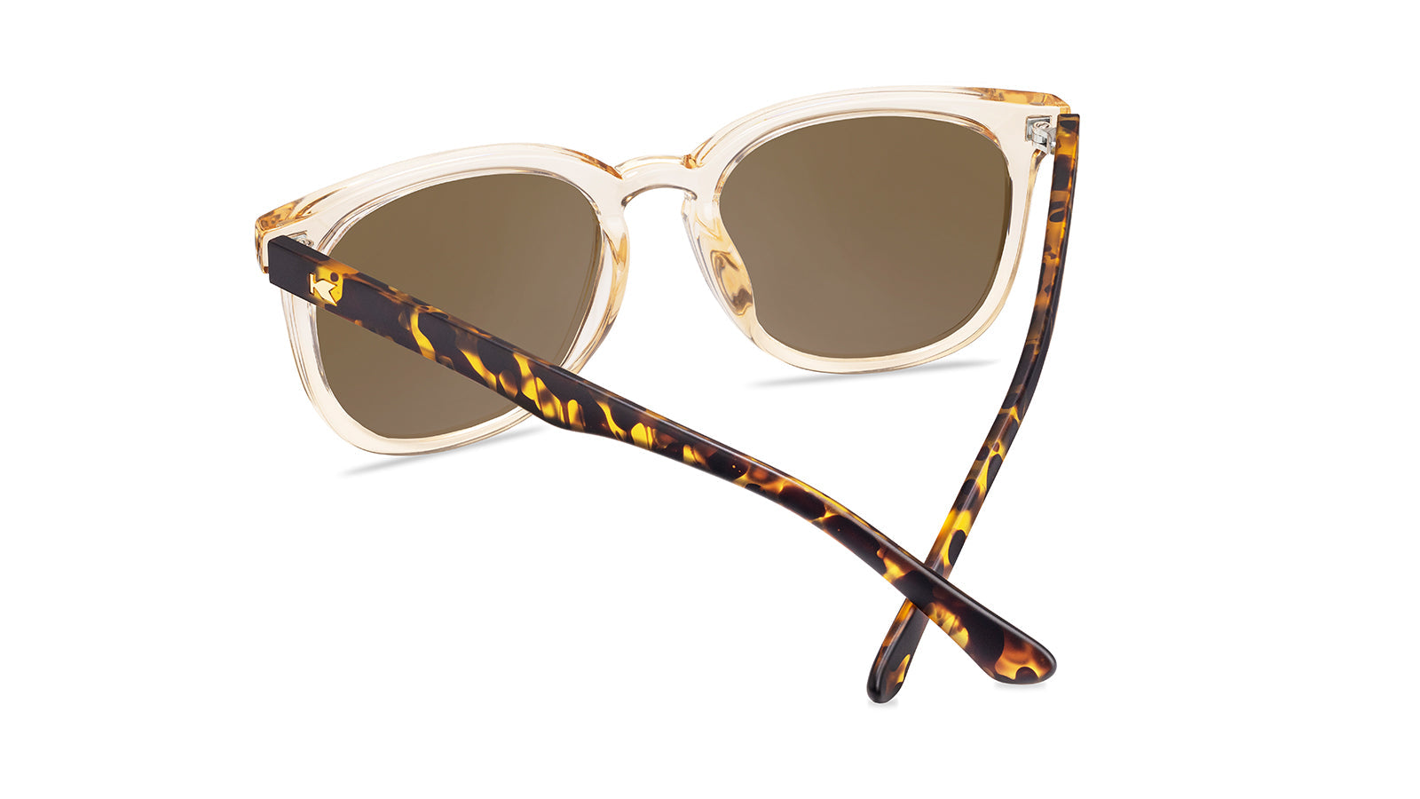 Sunglasses with Glossy translucent amber fronts Matte tortoise shell arms Polarized amber lenses