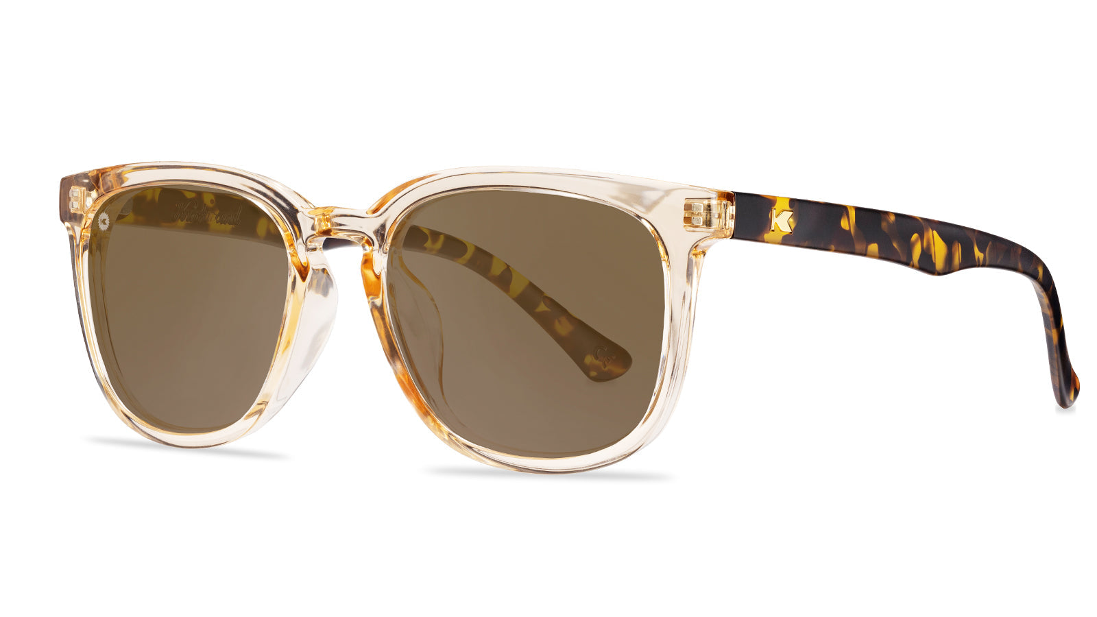 Sunglasses with Glossy translucent amber fronts Matte tortoise shell arms Polarized amber lenses