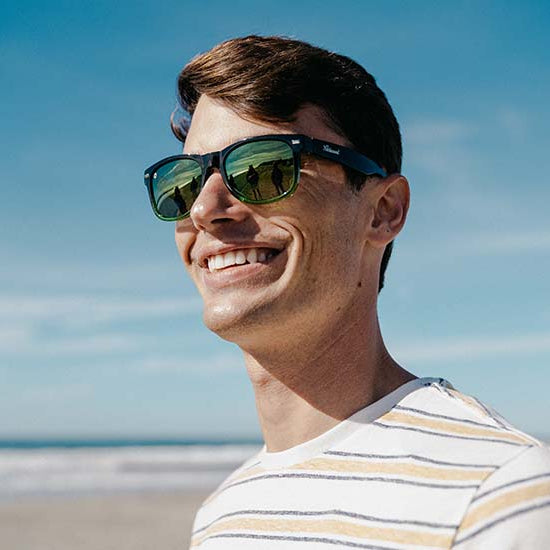 Sunglasses with Glossy Black Frames and Polarized Green Lenses, Model