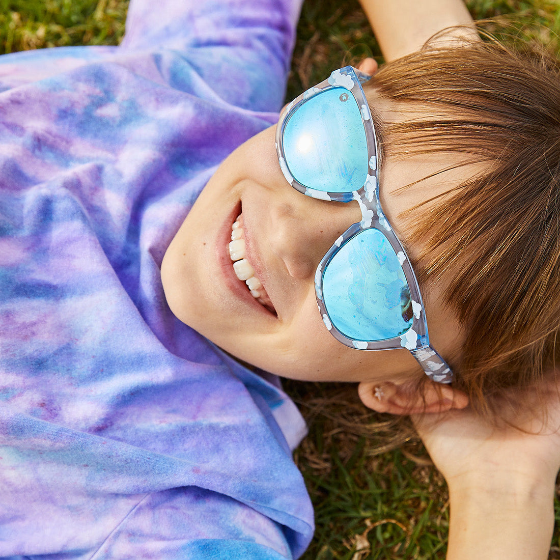 Sunglasses with Head in the Clouds Frames and Polarized Aqua Lenses, Model