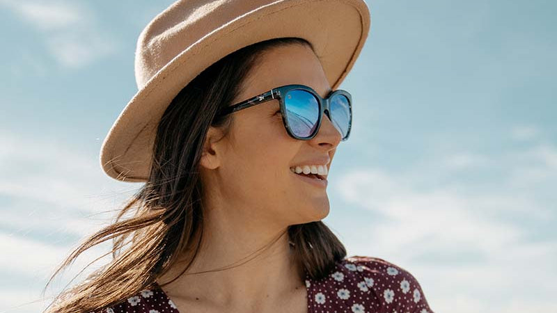 Sunglasses with Indigo Ink Frames and Polarized Snow Opal Lenses, Model