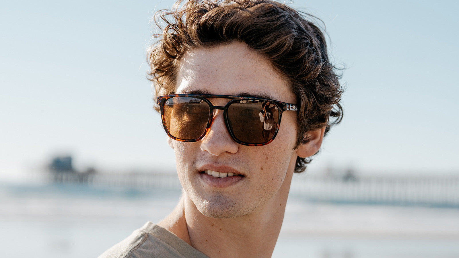 Sunglasses with Glossy Tortoise Shell Frames and Polarized Amber Lenses, Model