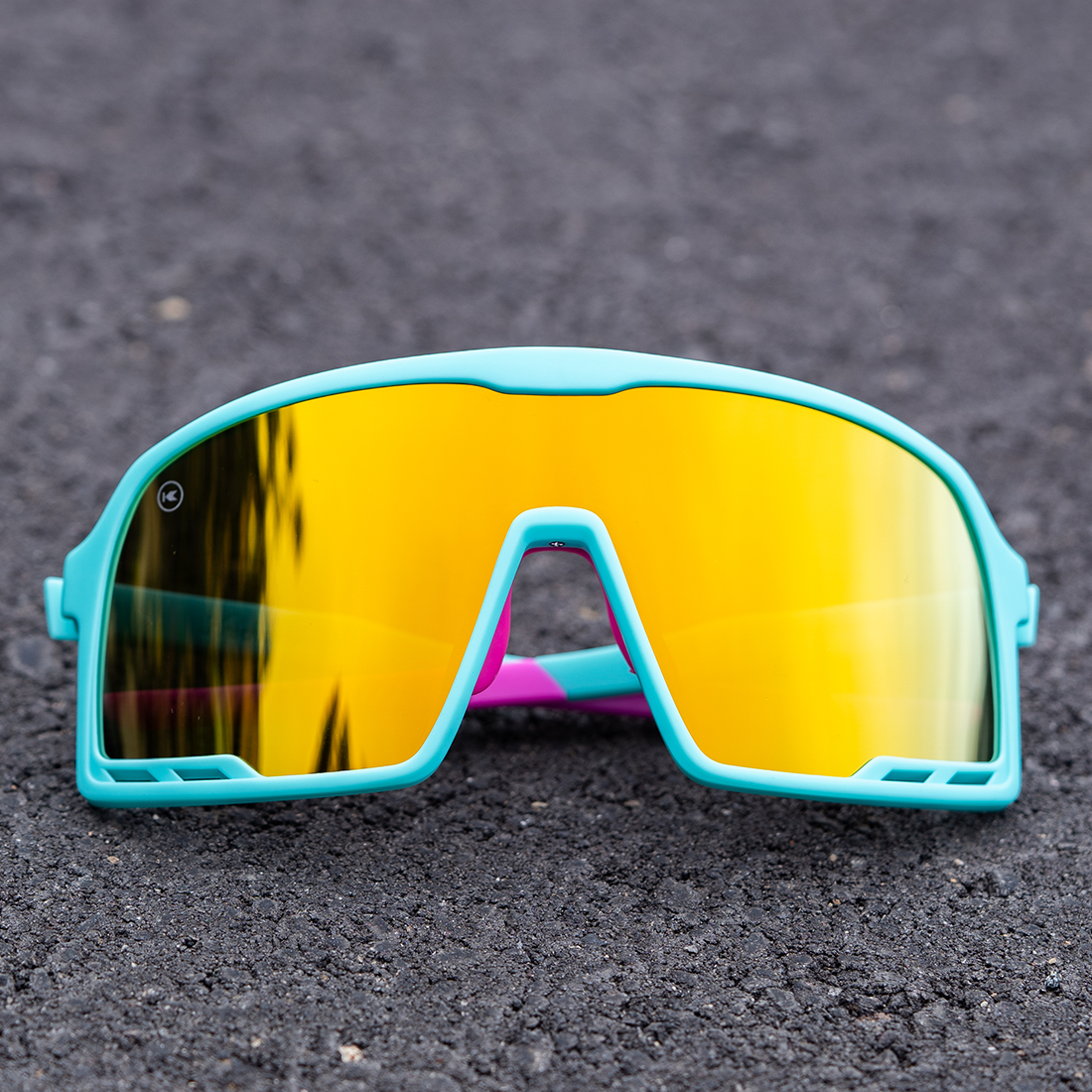 Sunglasses With Rubberized Aqua Frames and Yellow-Blue Lenses