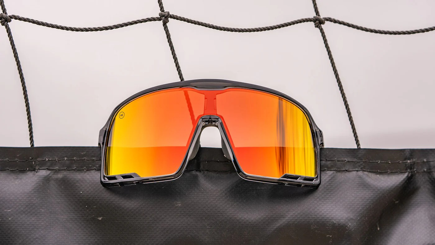 Sport Sunglasses with Clear Grey Frames and Red Sunset Lenses, Flyover