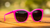 Sunglasses with Malibu Pink Frames and Polarized Smoke Lenses, Flyover