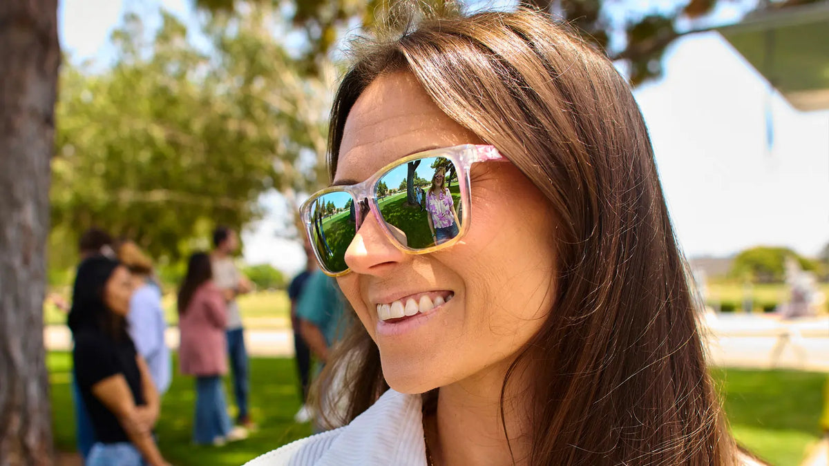 Women wearing Rainbow Sno-Cone Fast Lanes Sunglasses