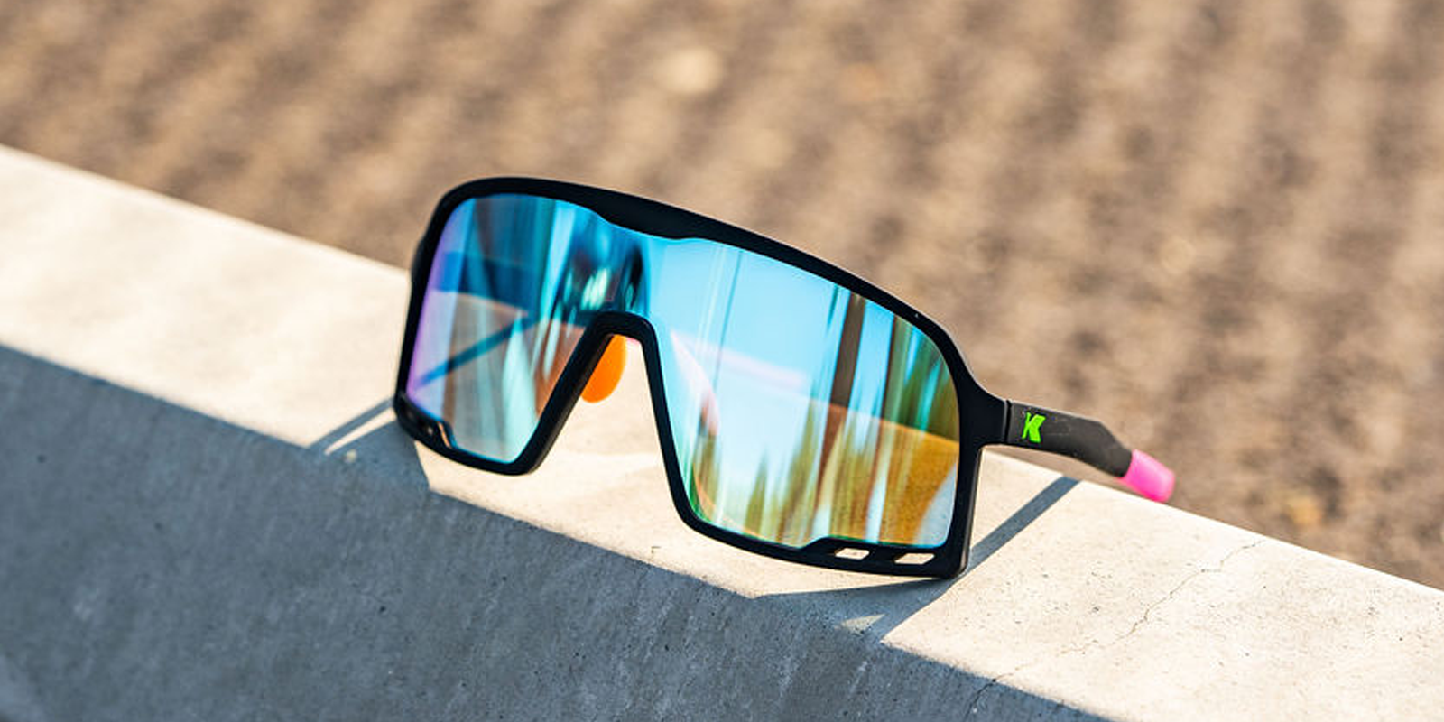 Knockaround Hang Time Campeones Sport Sunglasses with polarized blue lenses, Flyover