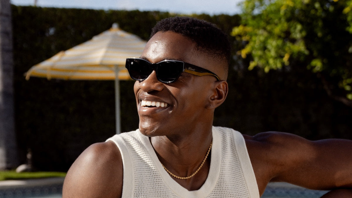 Male wearing Piano Black Junipers Sunglasses