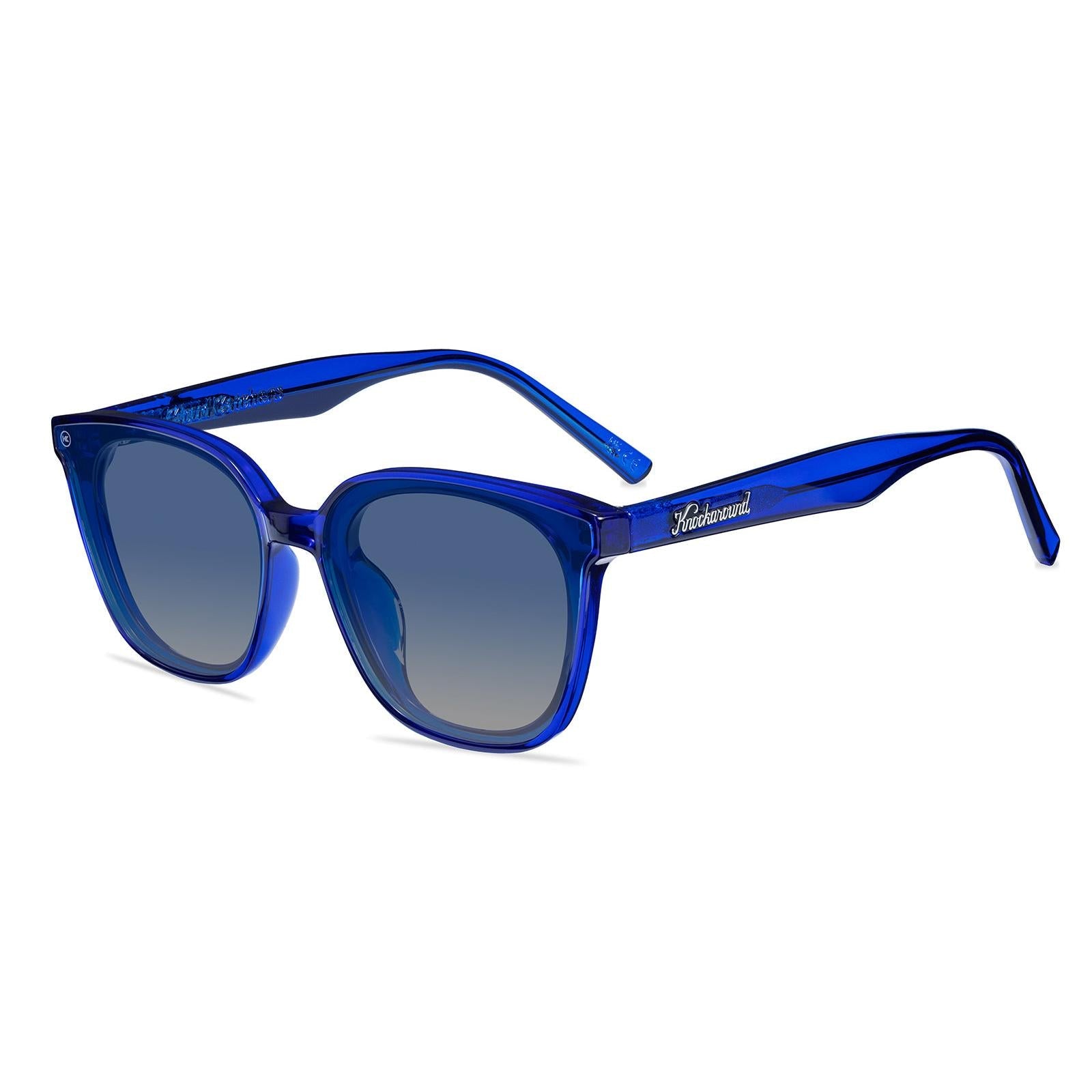 Sunglasses with a blue frame with polarized blue lenses, flyover