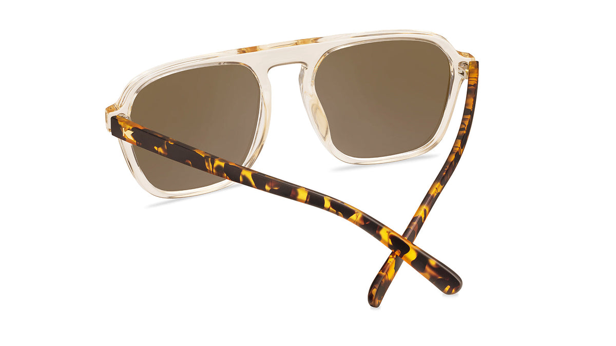 Sunglasses with Glossy translucent amber fronts Matte tortoise shell arms Polarized amber lenses